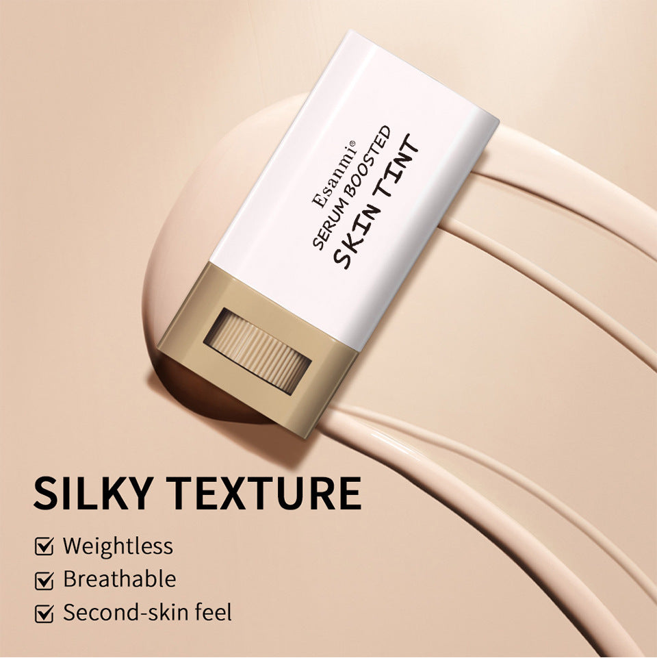 SilkTint stick gliding through cream showing silky texture